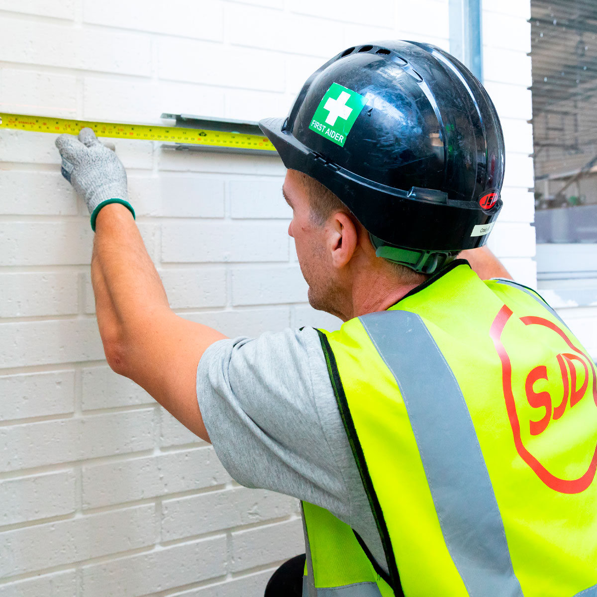 hospital corridor with mural on the wall