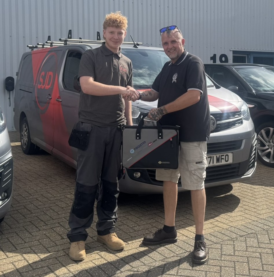 Apprentice being awarded a bag of tools